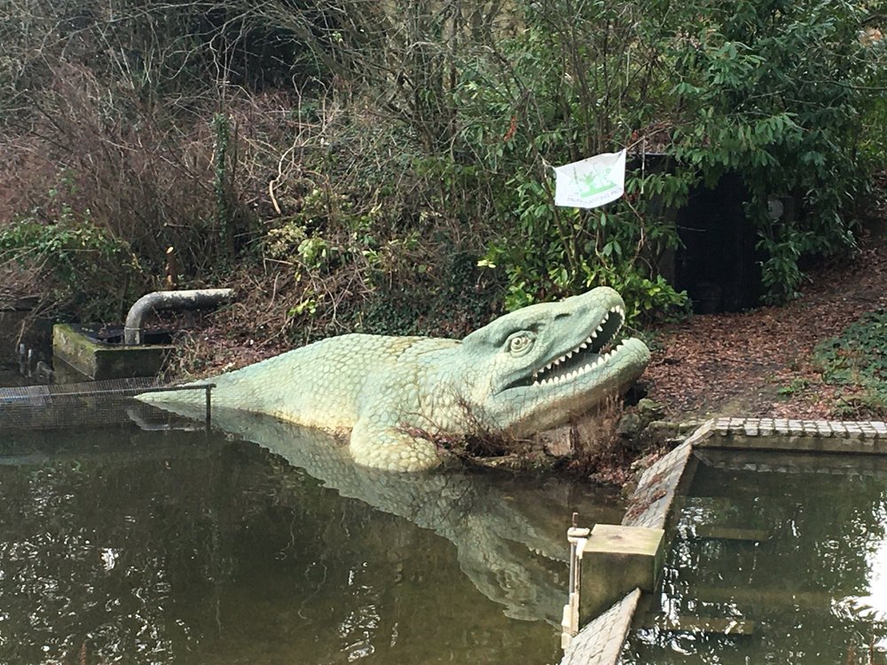  A Crystal Palace dinosaur peeking out of the lake, because the sculptor didn’t want to have to figure out what its body might have looked like. 