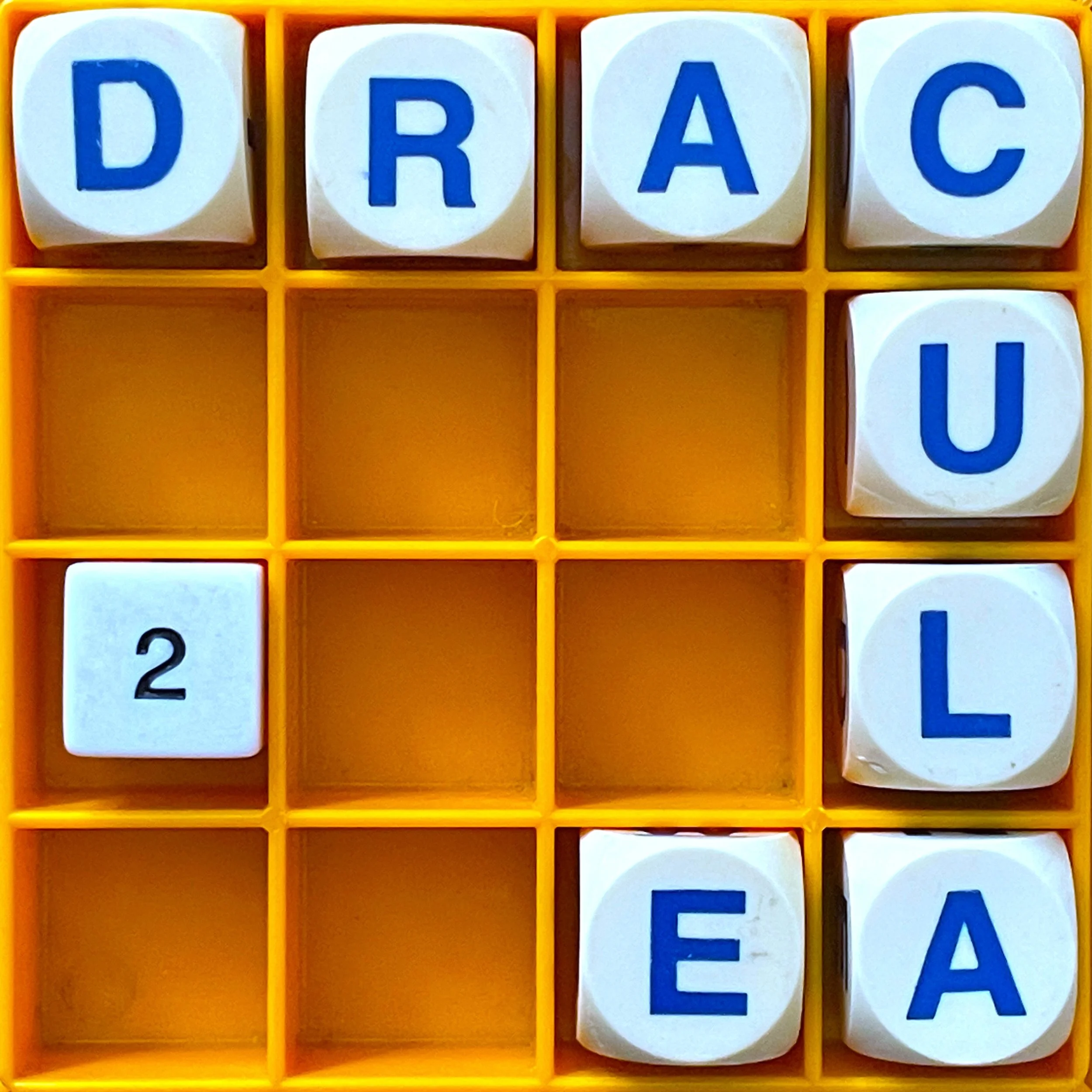 a boggle set spelling out the words Draculae 2