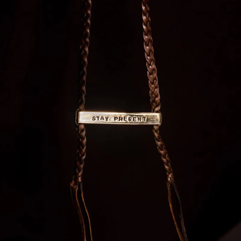 StayPresent_Necklace_BlackBackground.jpg