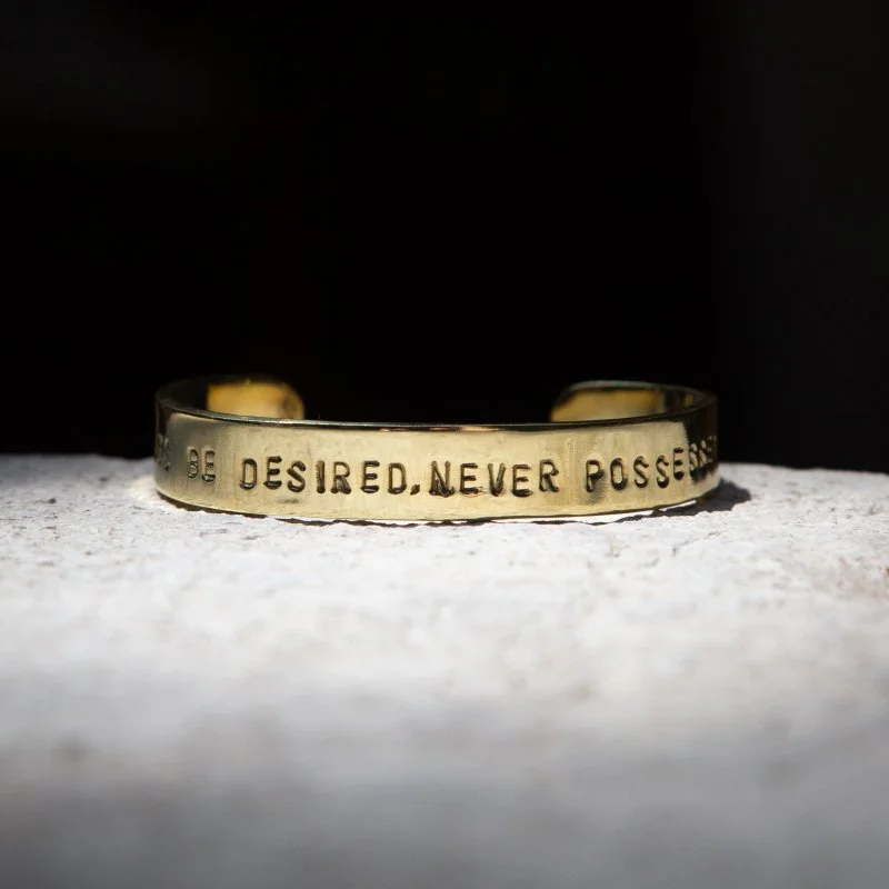 ALWAYS BE DESIRED NEVER POSSESSED (CUFF)