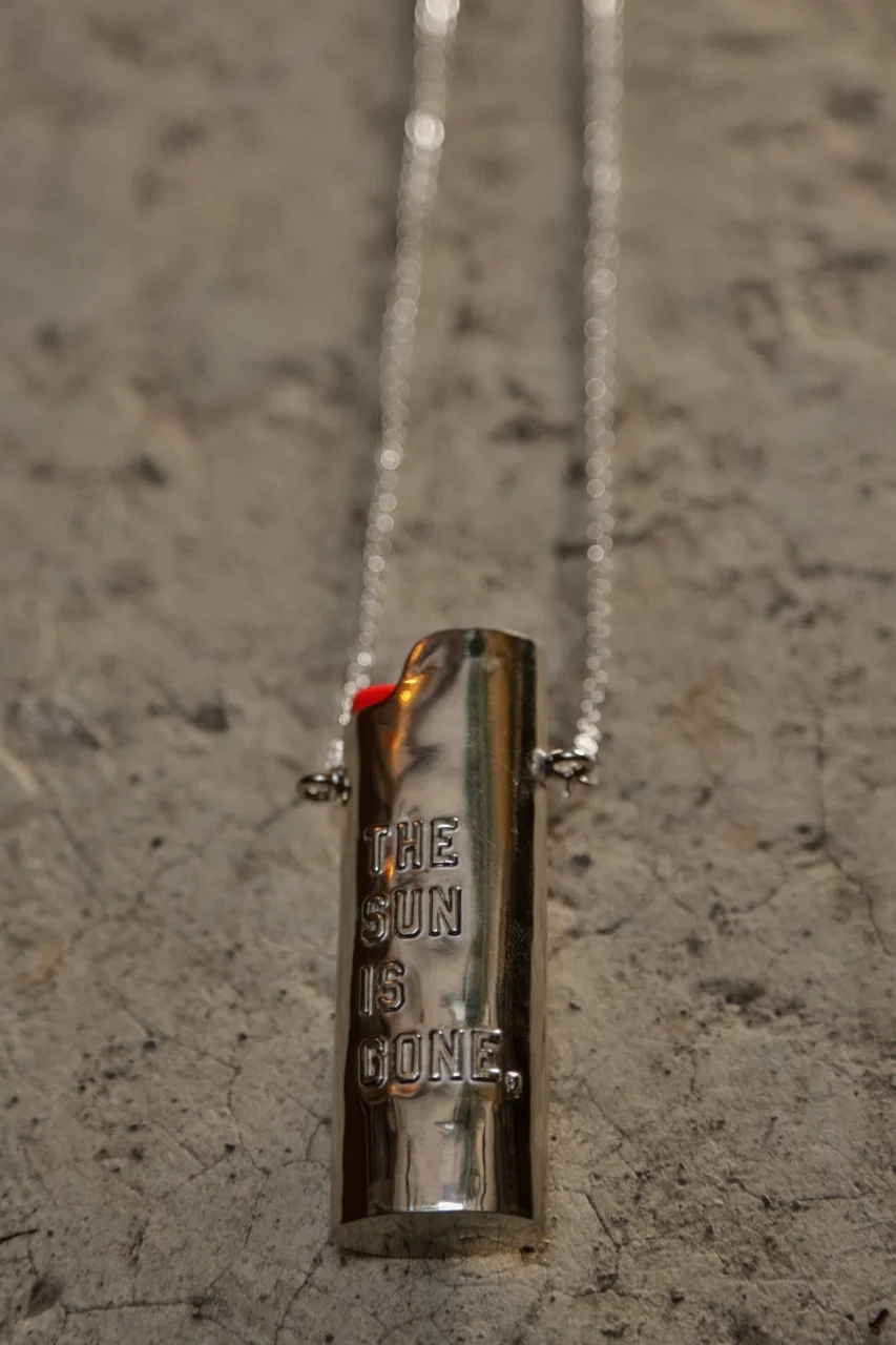 13lighter holder. the sun is gone. .JPG