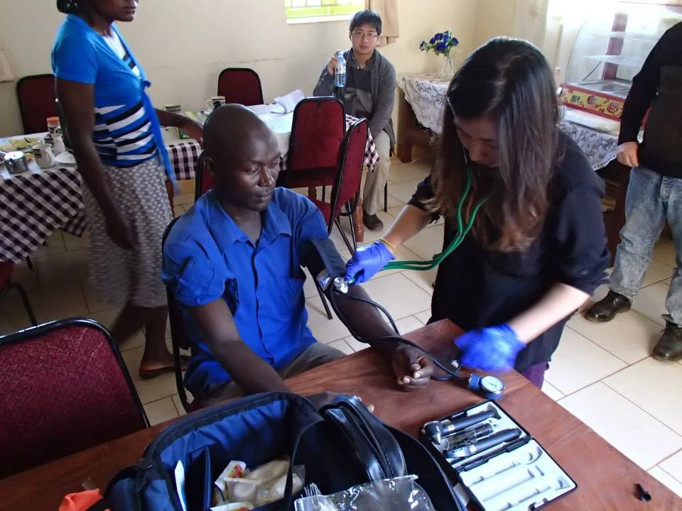 A few basic vital sign checks on some of the locals. This is the first time this 37 year old man had his blood pressure checked..jpg