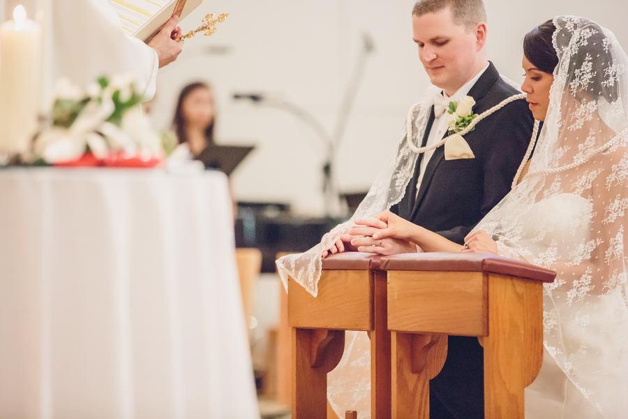 Rachel Bauer & Tony Ankrapp's Charleston wedding at St. Benedict's Catholic Church