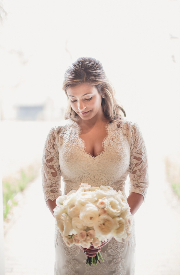 Charleston Bride in Lace Gown with Sleeves