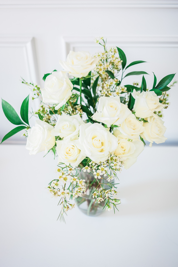 White rose centerpiece at Charleston wedding at Cooper River Room 