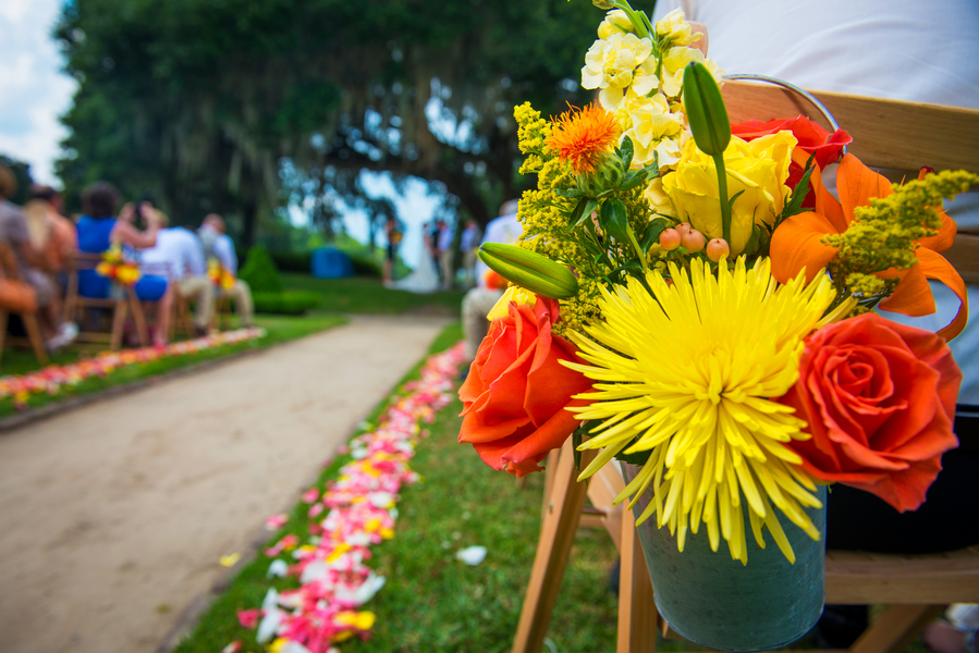 Yellow and orange aisle runners at Middleton Place wedding