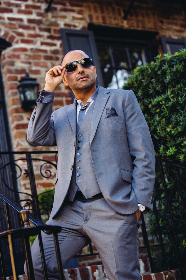 Groom in grey suit at Indian wedding