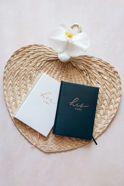 Straw fan and wedding vow books at The Westin Hilton Head
