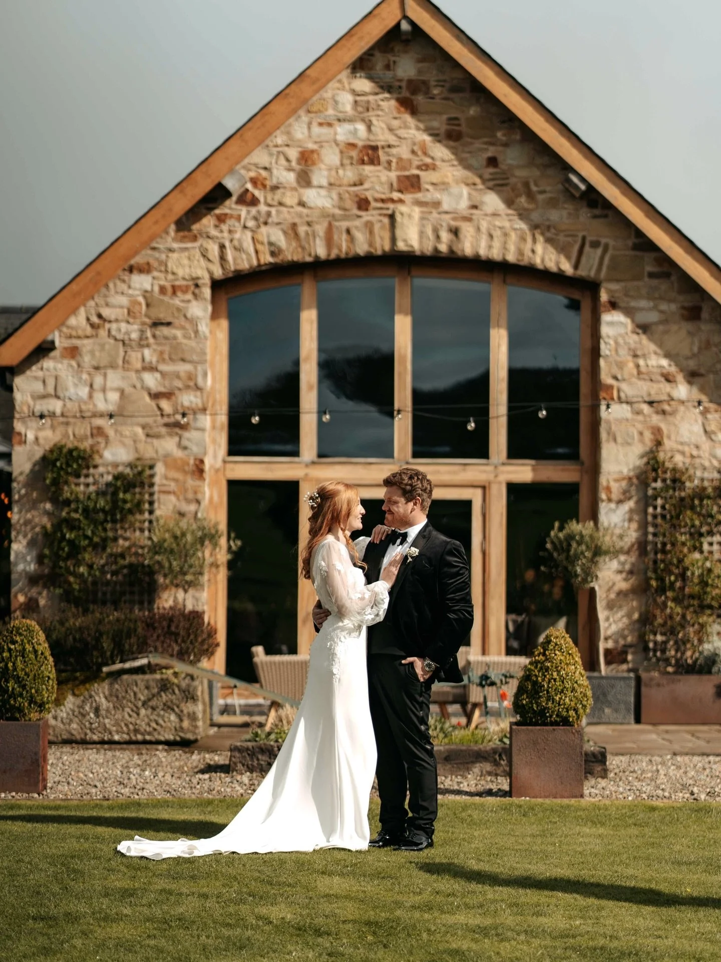 Sumer &amp; Lewis 

Dress - @shropshirecountrybrides 
Alterations - Code : Bridal
Flowers - @white_fields_florist 
Hair - Nicky Davies
Makeup - CharlotteGriffithsmakeup
Band - Neon Rodeo
Rings - @rowsjewellerschester