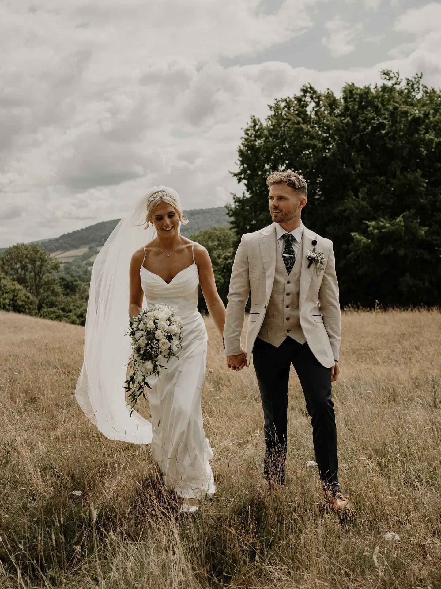Kisha and Ben 

Hair - Mandy - occasionhairbymandy
Make up - Lucie &amp; Sarah -  @luciej_mua &amp; sarahwatersaesthetics
Dress - Brides of Chester - @bridesofchester 
Suits - GROOM - groomformal 
Flowers - Jayne Griffiths - @jaynesflowerstudio