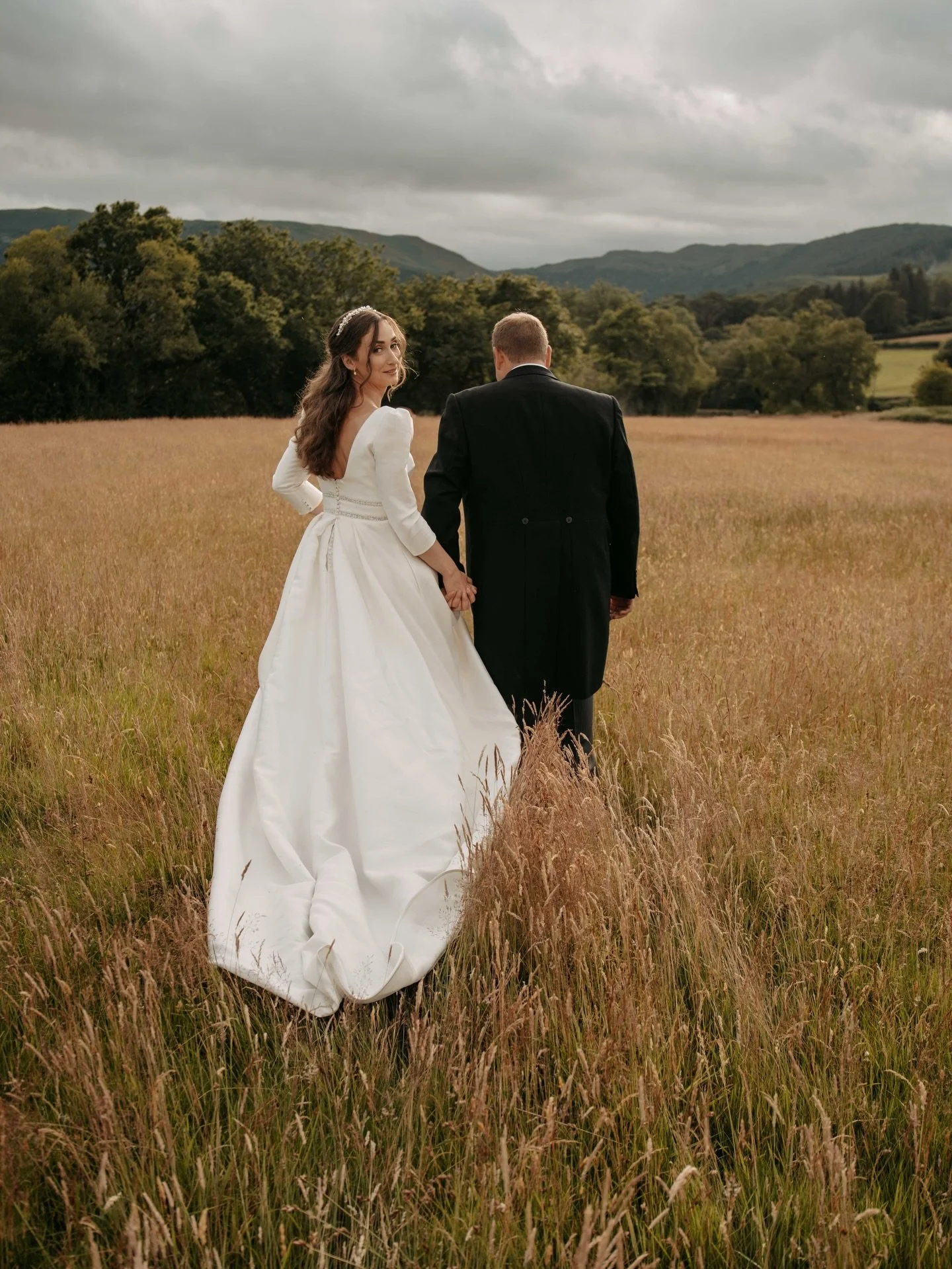 Alice &amp; Nick 

Dress: @bridalcric 
Suits: Symonds
Hair: @corallewisbridal 
Makeup:  @luciej_mua 
Flowers: Jayne Griffiths Florist