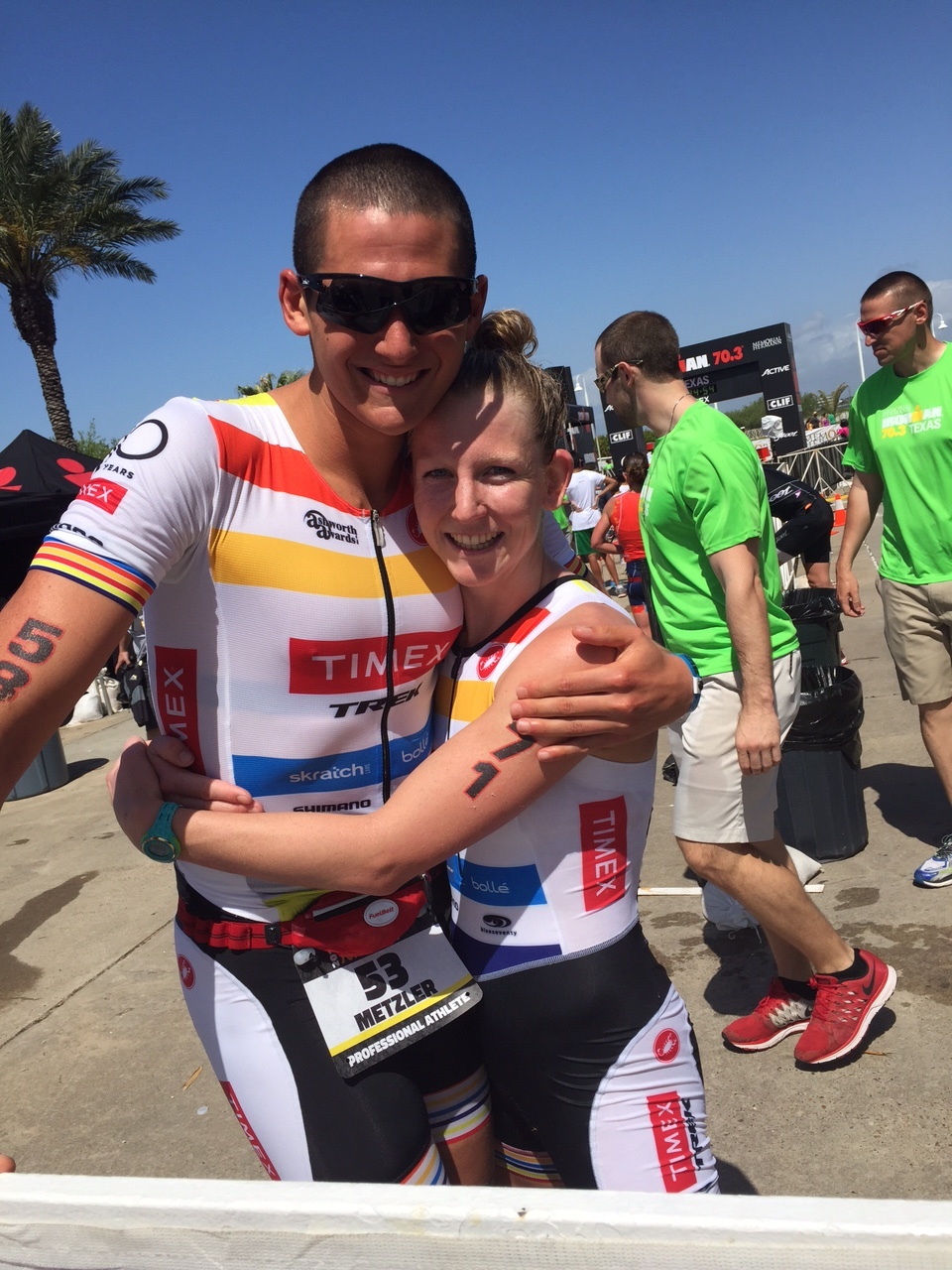 Justin Metzler and Jeanni Seymour embrace at the finish line