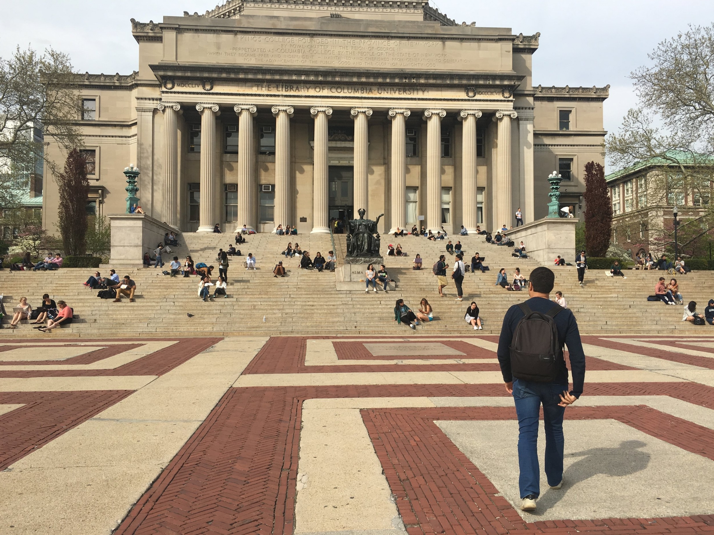 Murilo walks toward the Low Memorial Library on campus