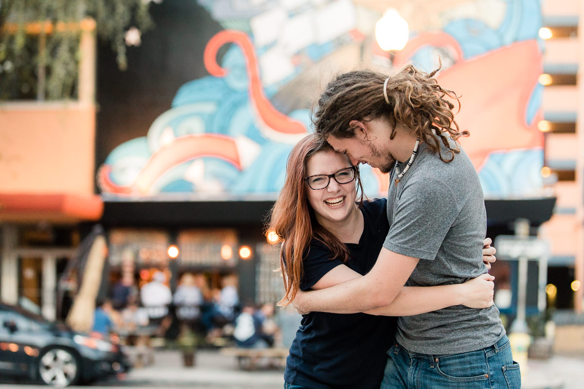 Engaged couple in downtown St. Petersburg, Florida