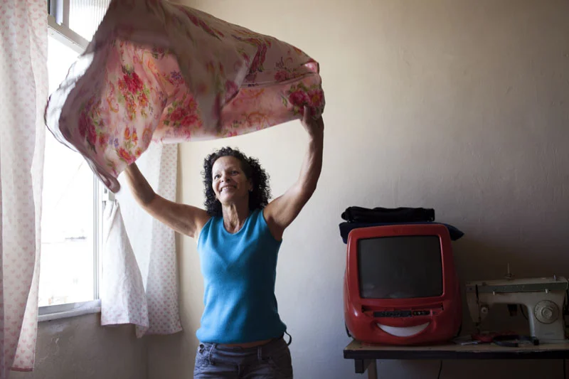 She makes a living by cleaning the neighbors' apartments and taking care of the children. Being with children is her biggest joy. She looks after her seven-year-old granddaughter Ketlyn .