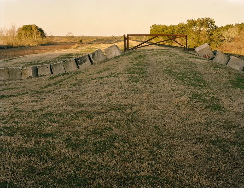 Levee, Verret, St. Bernard Parish , 2018. Digital Print 40x50 inches. ©Alison Gootee