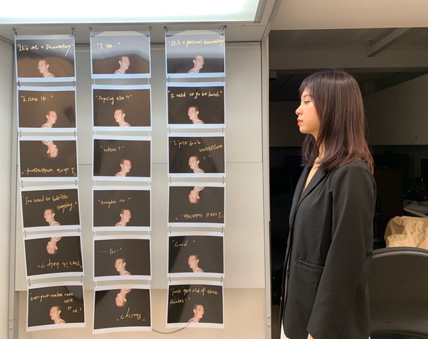 Thesis student Collin Xueqing Yin mimics the subject of display.