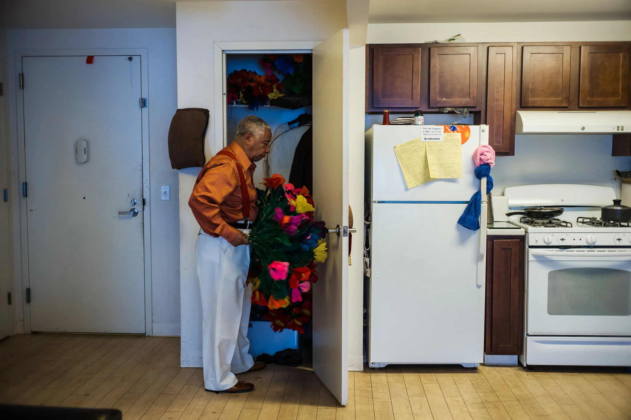 Olmedini holding props in his apartment. credit: Jaime Permuth
