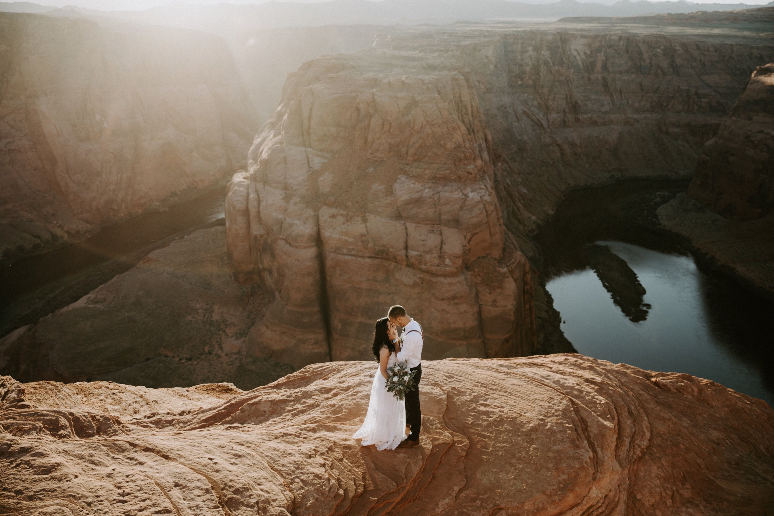 Intimate ceremony during elopement at Horseshoe Bend in Page Arizona