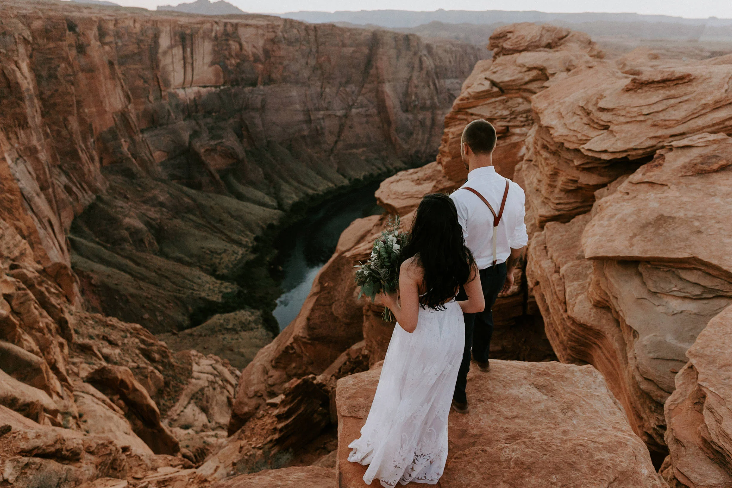 Intimate ceremony during elopement at Horseshoe Bend in Page Arizona