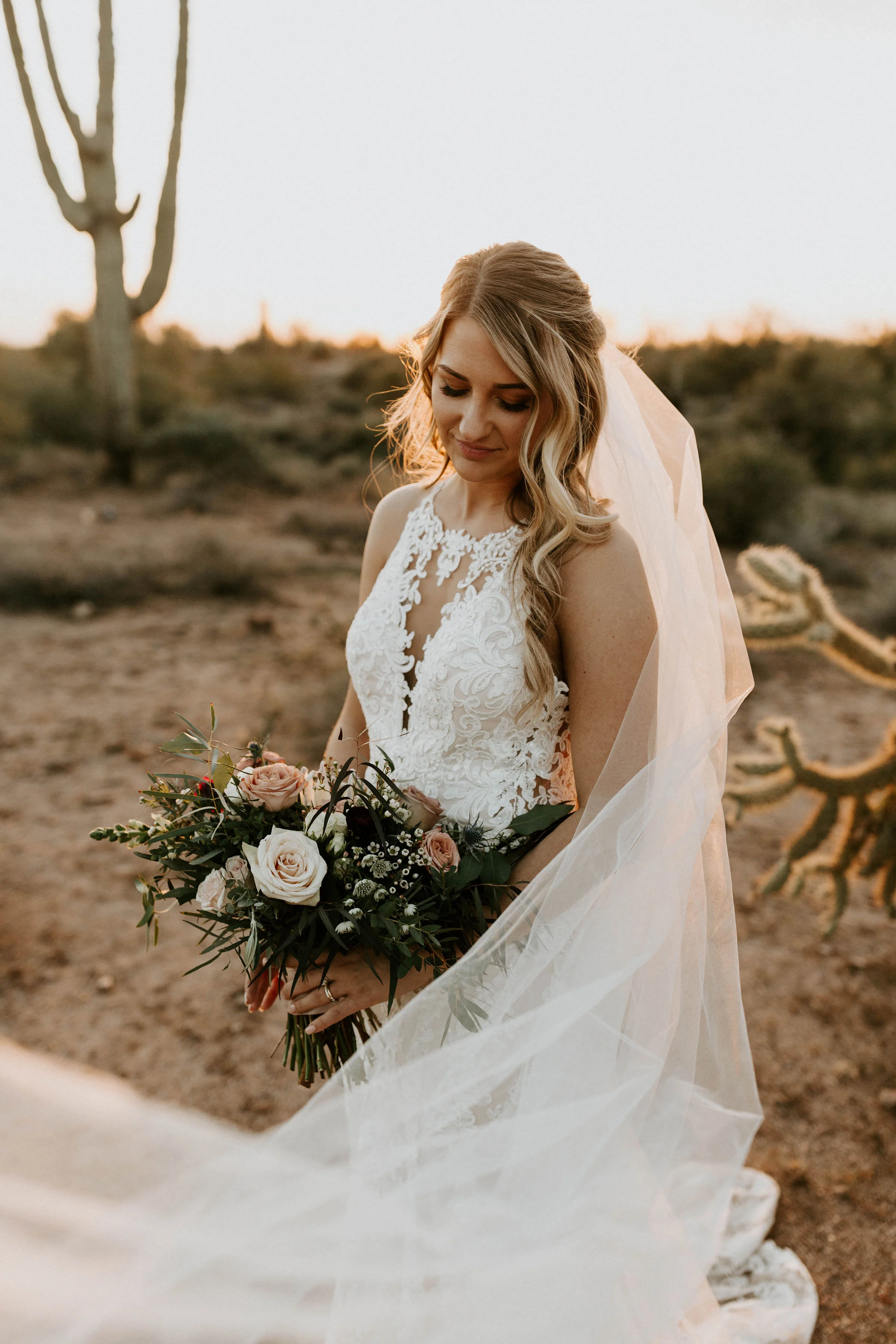 Bride and veil in desert at Paseo Wedding venue