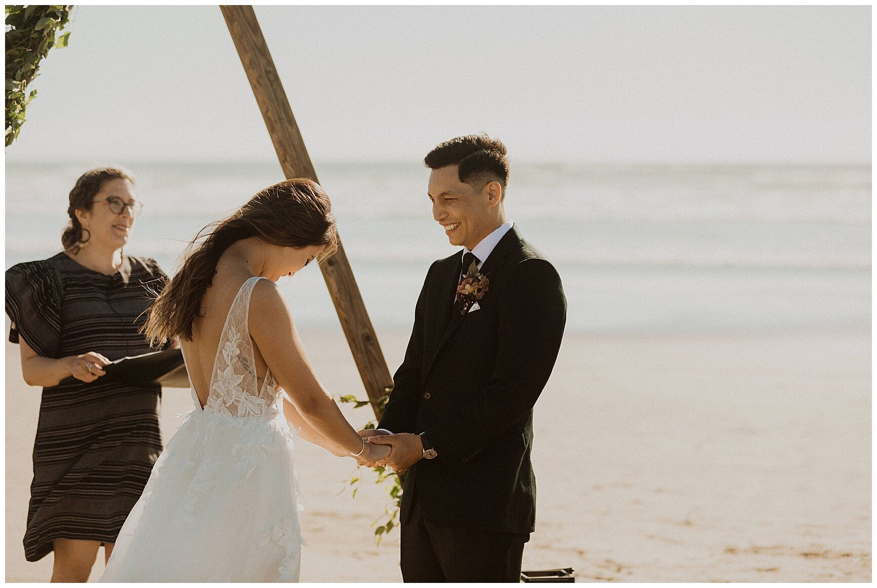 bride and groom exchanging vows on Canon beach for their elopement