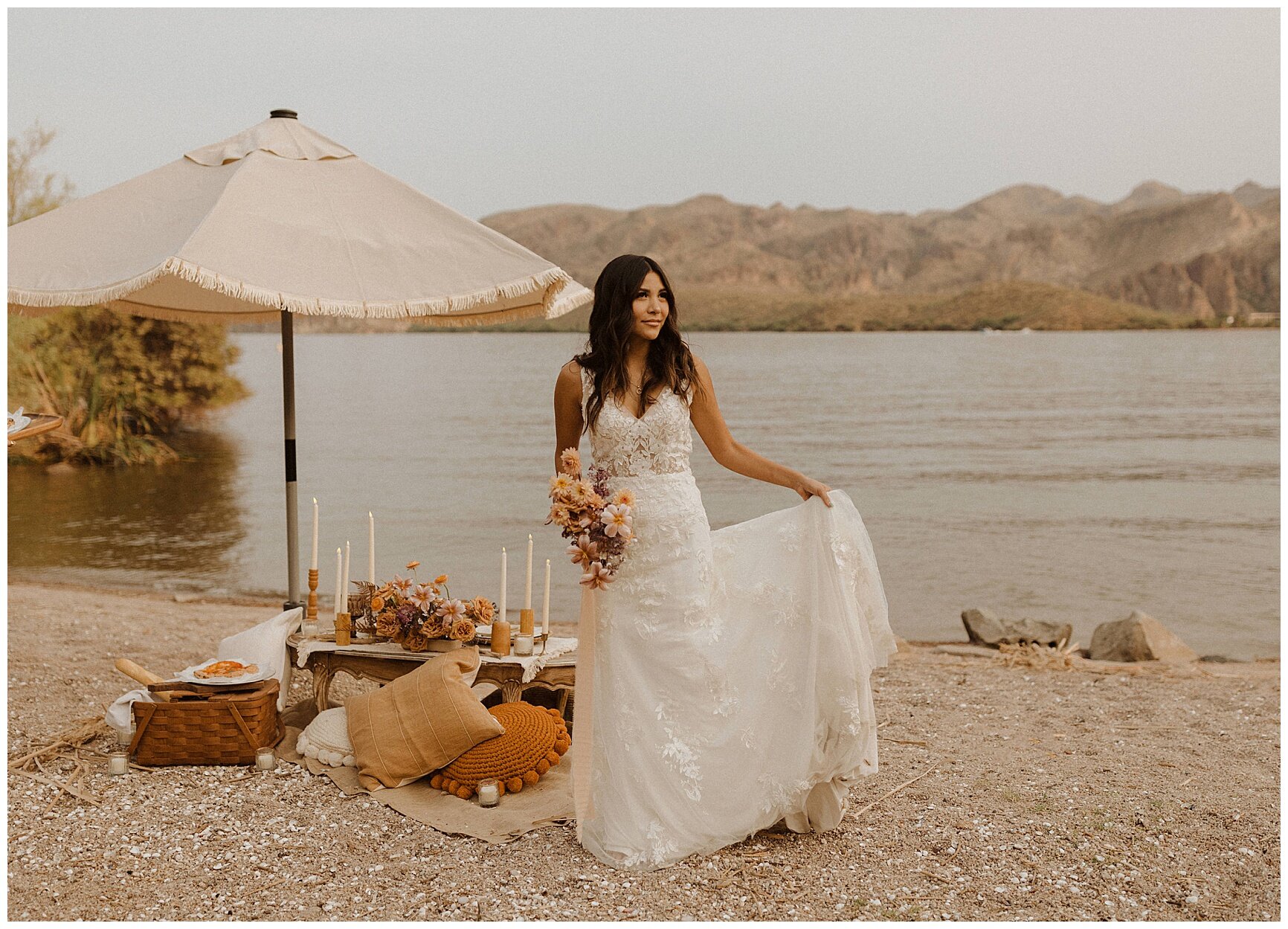 bride holding a lush bouquet of caramel yellow and purple tones during a saguaro lake elopement