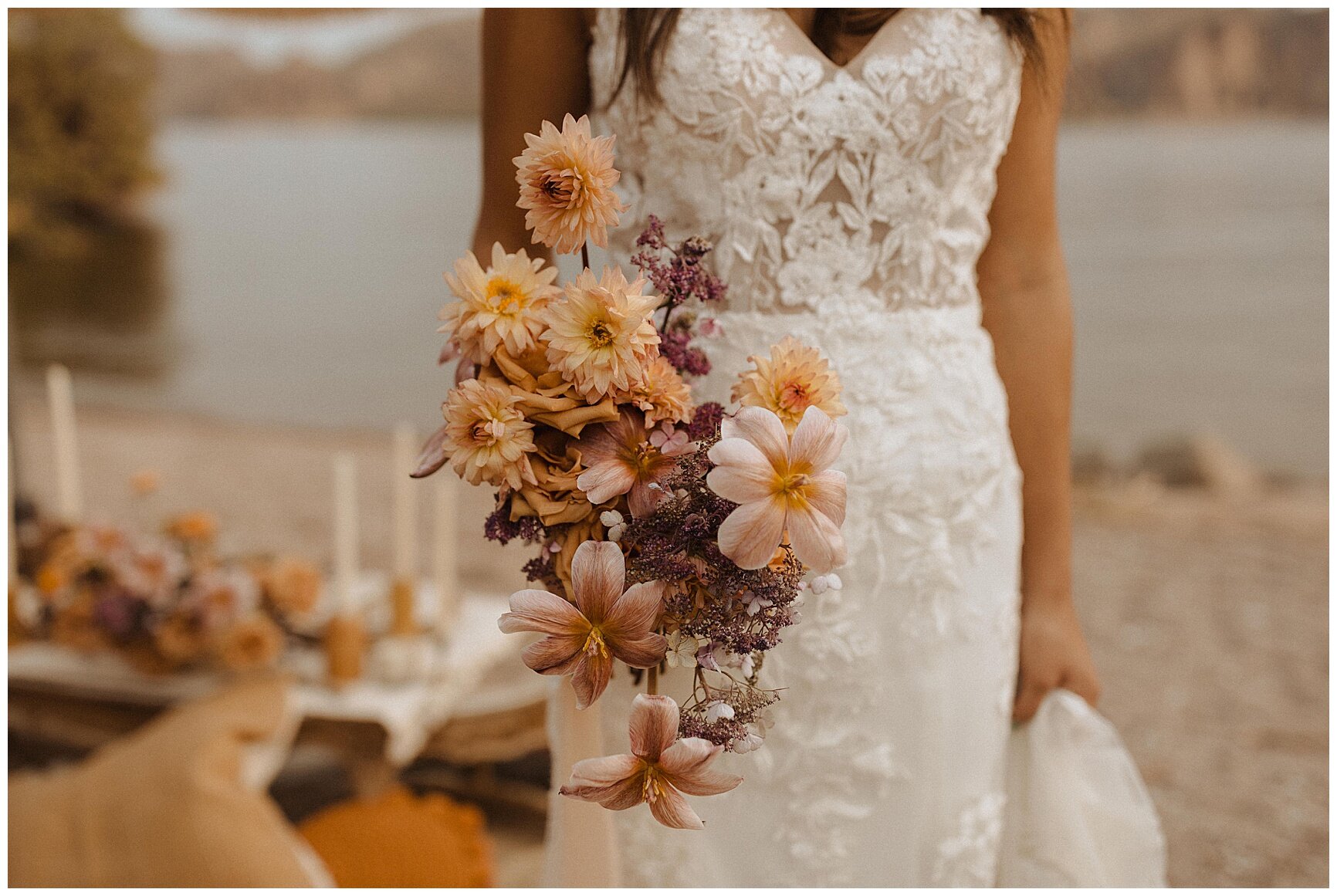 bride holding a lush bouquet of caramel yellow and purple tones