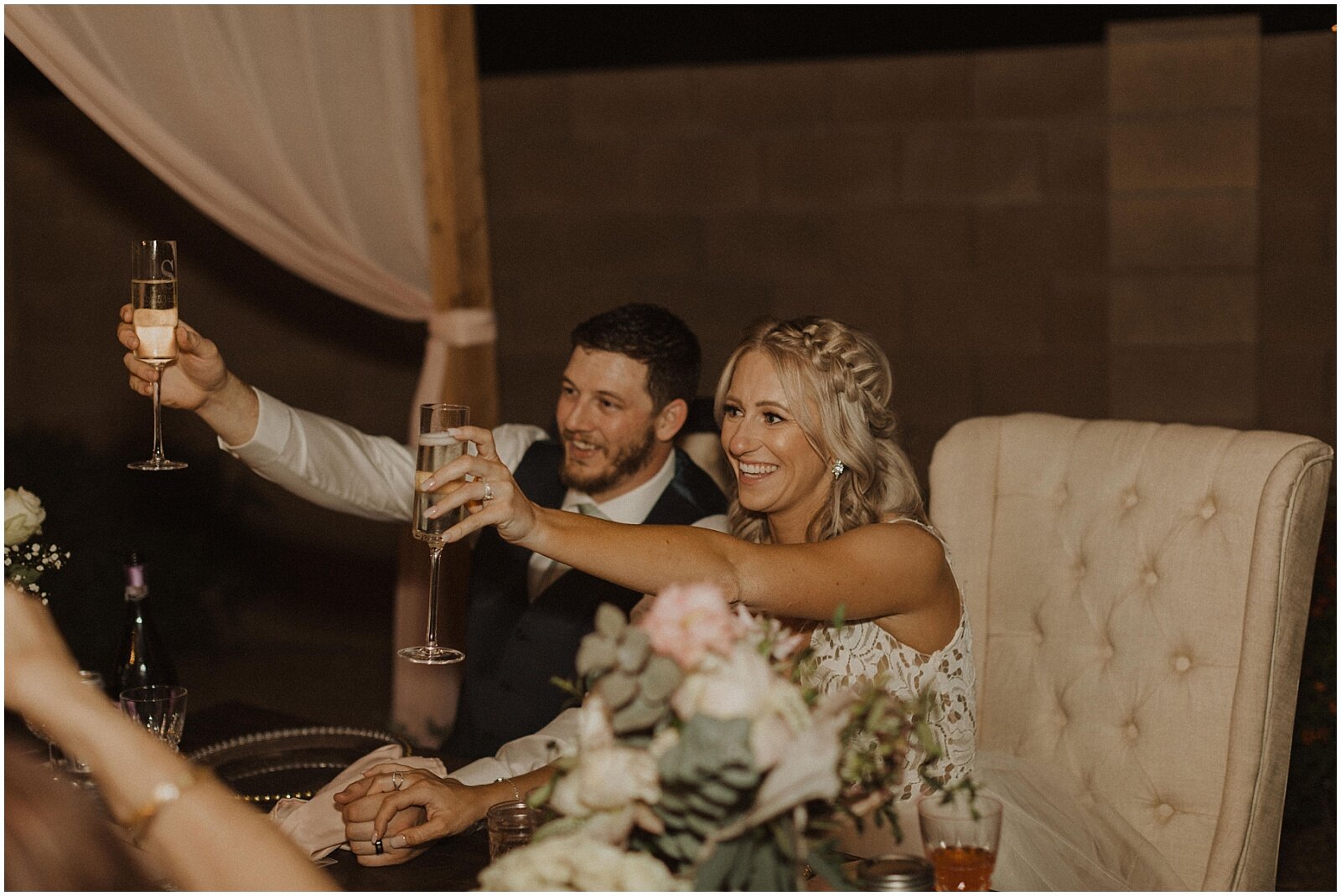 bride and groom champagne toast during wedding reception