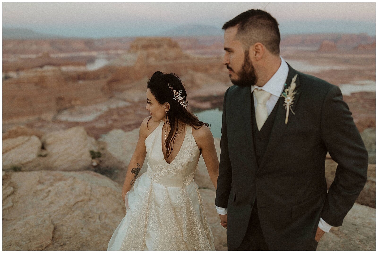 bride and groom desert elopement in page, arizonabride and groom posing in the desert for their elopement in page, arizona