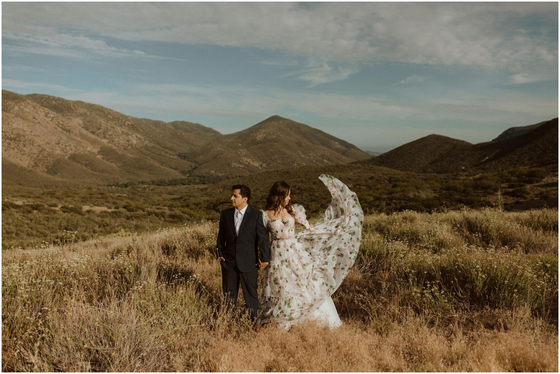 couple taking engagement photos in the california mountains