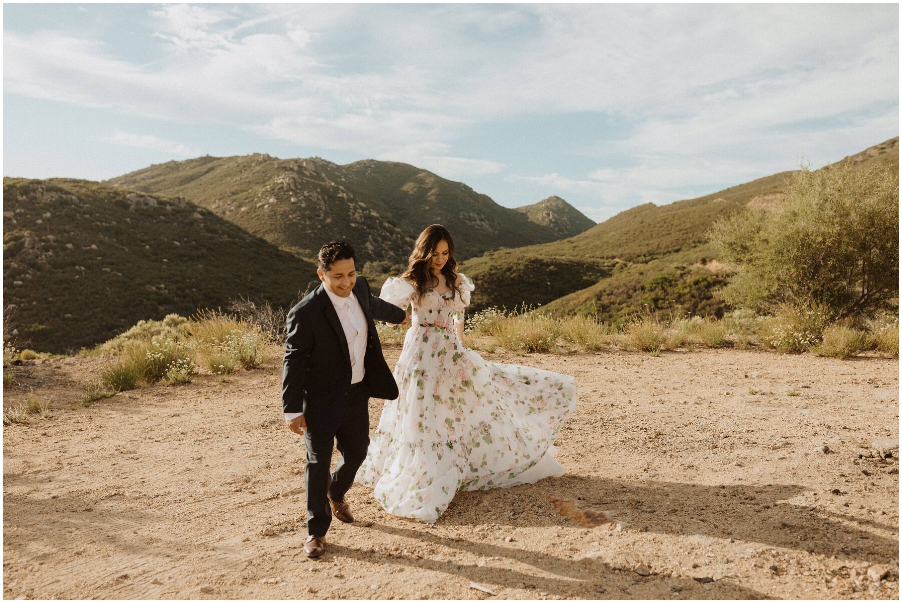couple taking engagement photos in the california mountains