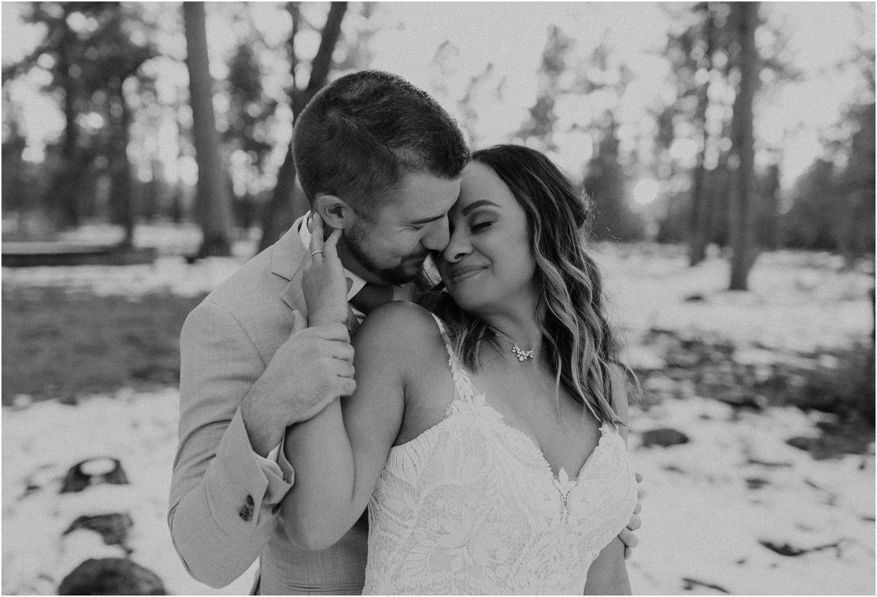 bride and groom portraits in the snow after their cabin elopement in Pinetop, Arizona