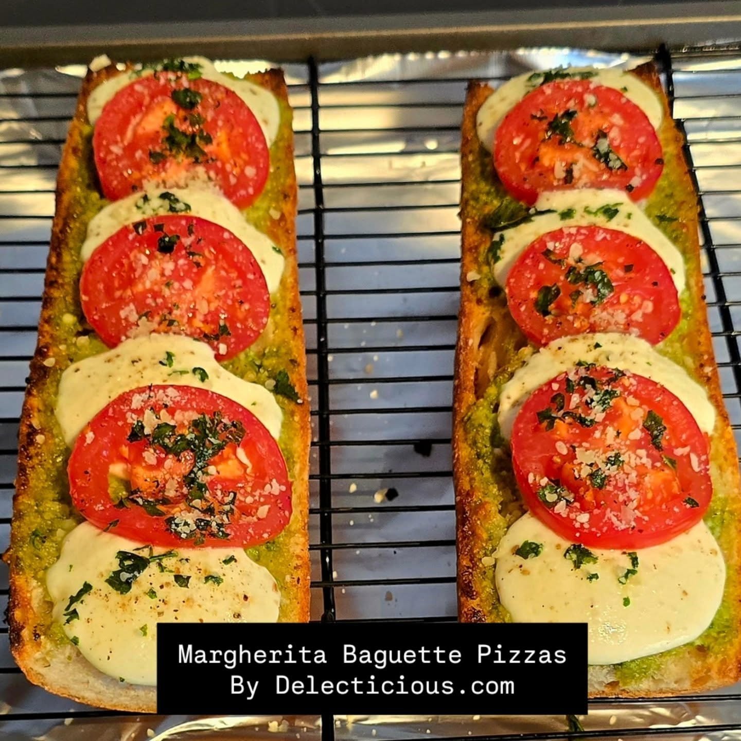 Fresh mozzarella, Capari tomatoes, basil pesto on a crsty baguette.  Dinner, lunch  or cut it into appetizer bites. So good!

Recipe: https://www.delecticious.com/blog-posts/2026/2/6/margherita-baguette-pizza

#pizzalovers🍕 #sandwichrecipe #appetize