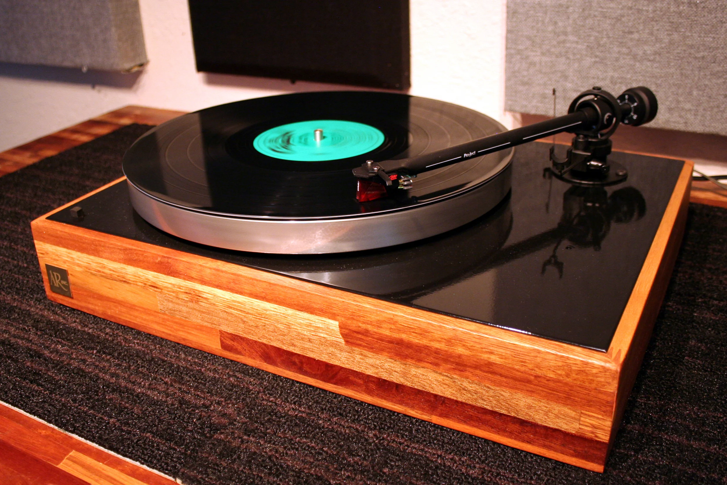 The ProJect Red ProJect tone-arm, Ortofon 2M Red cartridge, custom GHA mahogany plinth, gloss black top, and custom GHA dustcover. Sold.