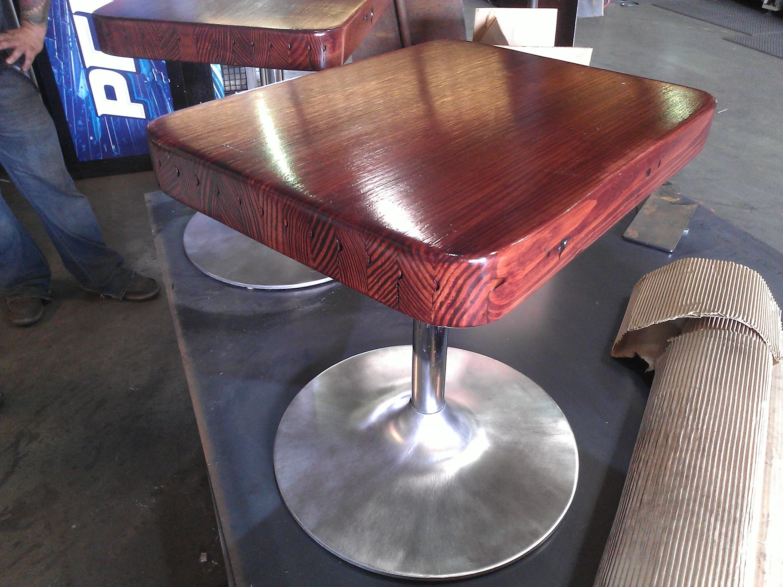 Matching end tables from bowling wood and the salvaged bases from ash trays. Sold.