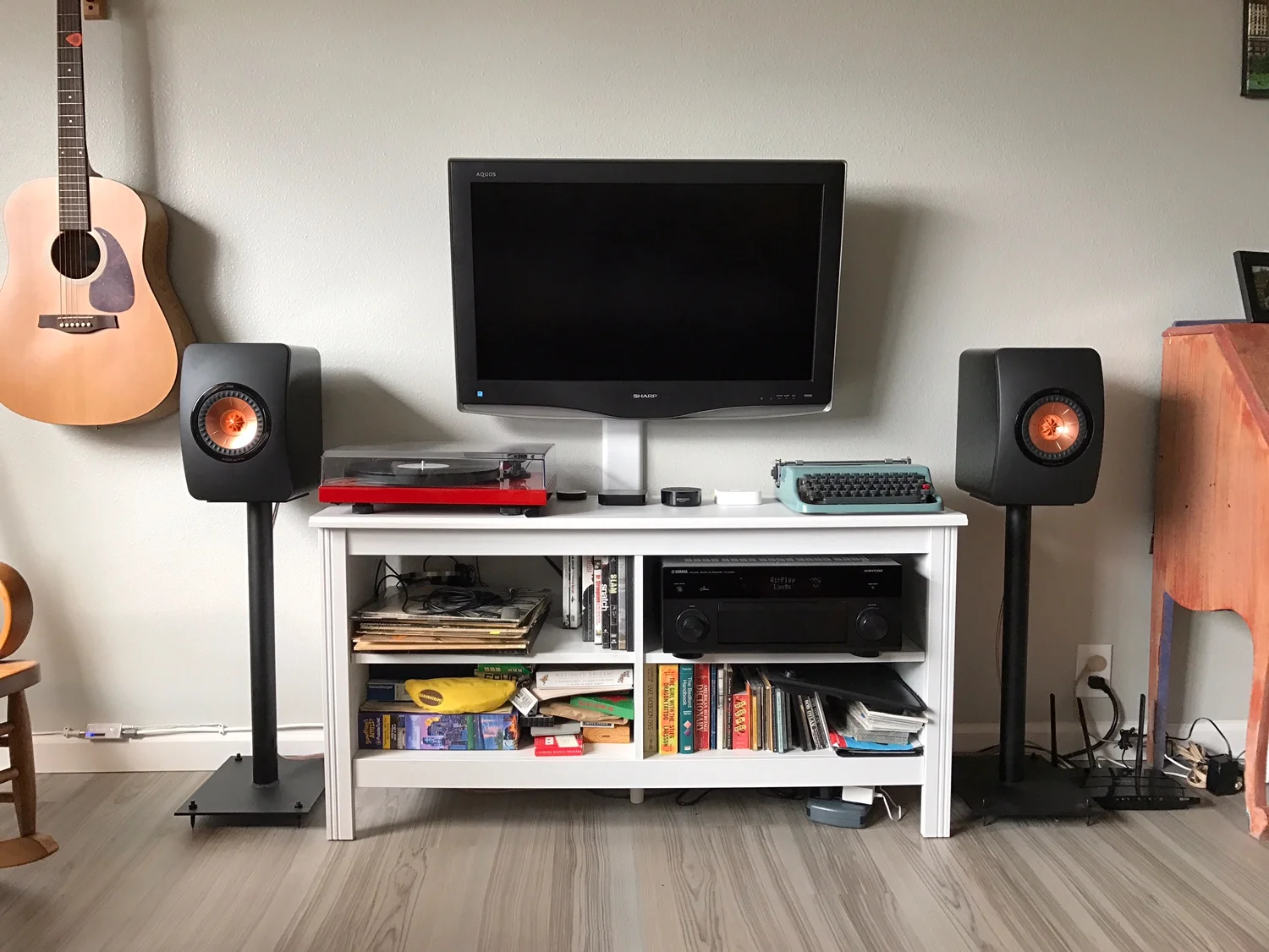 Kailin System: Yamaha AV receiver, ProJect Debut Carbon turntable/Ortofon Red, KEF LS50 speakers, GHA custom speaker stands.