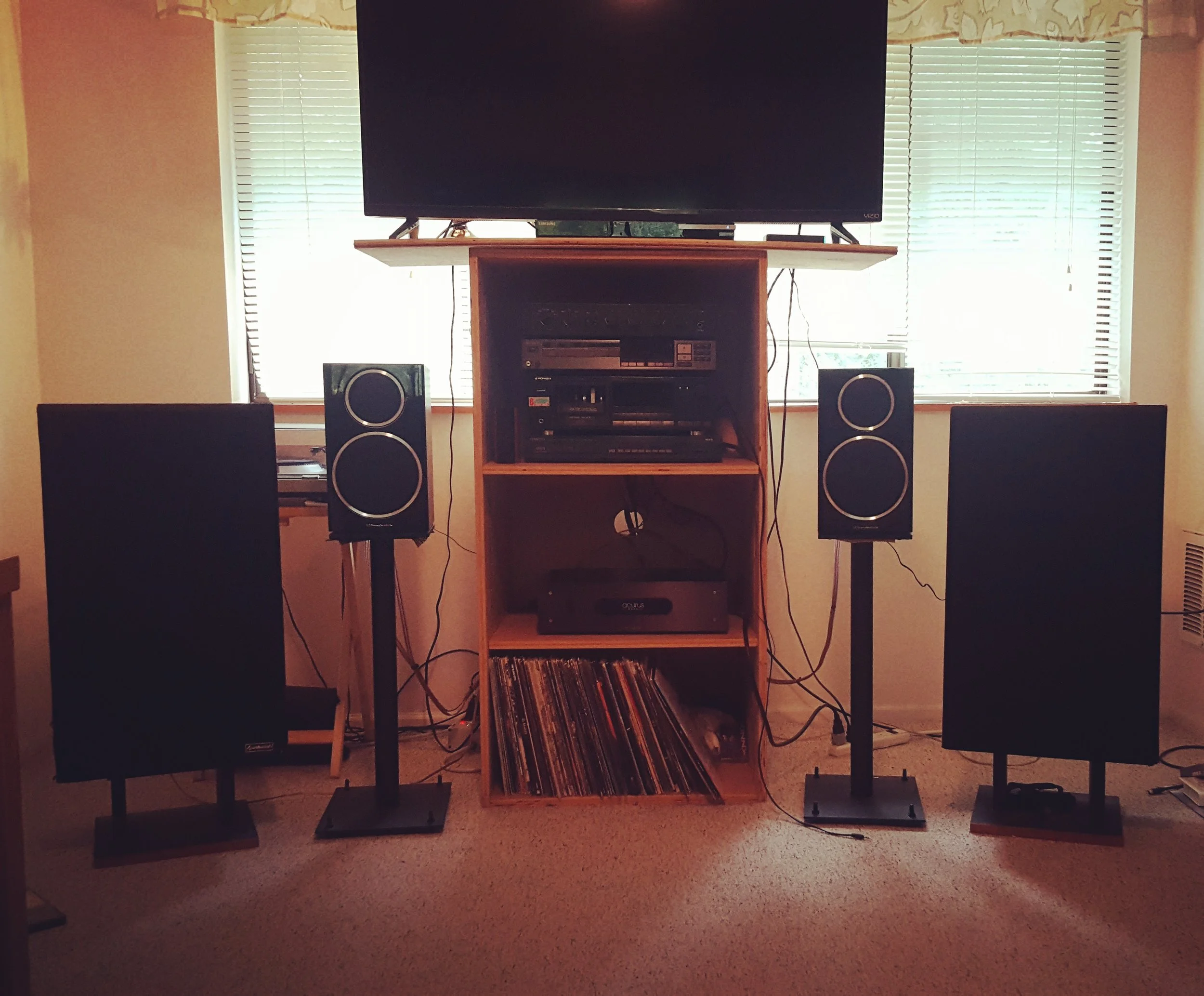 Jacob E System: Acurus A200 amp, Hafler preamp, Speaker lab 4s, Wharfdale 22 on GHA stands.