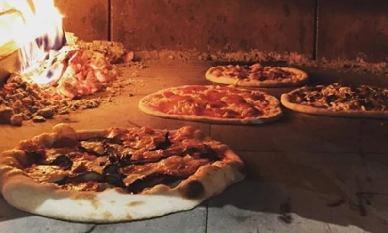 Millville Pizza Co Downtown Gig Harbor. Wood fired. Great beer, great wine, salads, bangin pizza, GHA sound system. You're home.