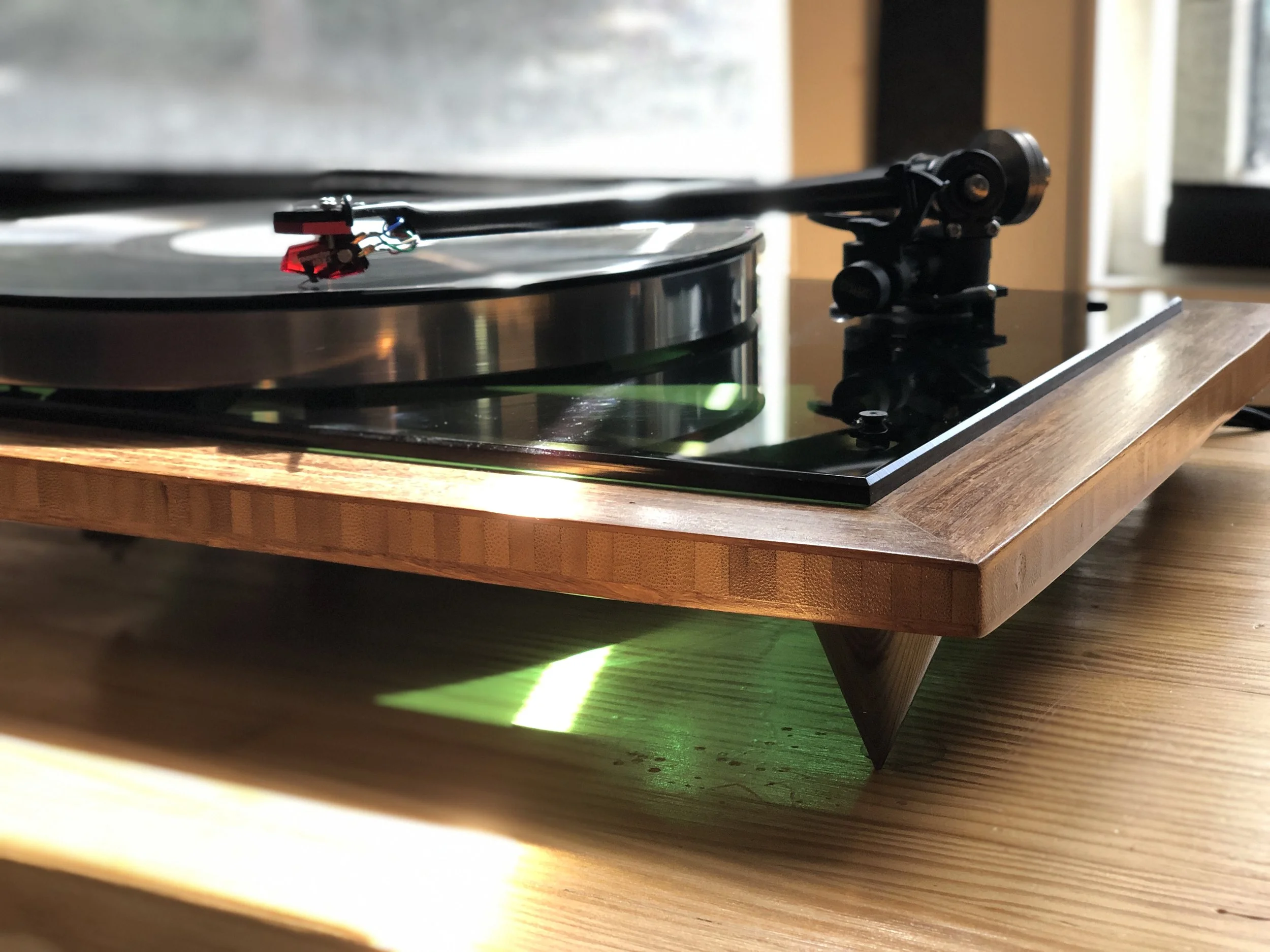 Green Acoustic Research T-bar, platter, sub-platter, green plexiglass top plate, Rega 303 tonearm, Hurst 300 motor, bamboo custom built base, rocker on/off switch, 2.5 inch metal spikes, custom dust-cover. $999 w/out cartridge (shown with Dynavector 10X5 = $749).