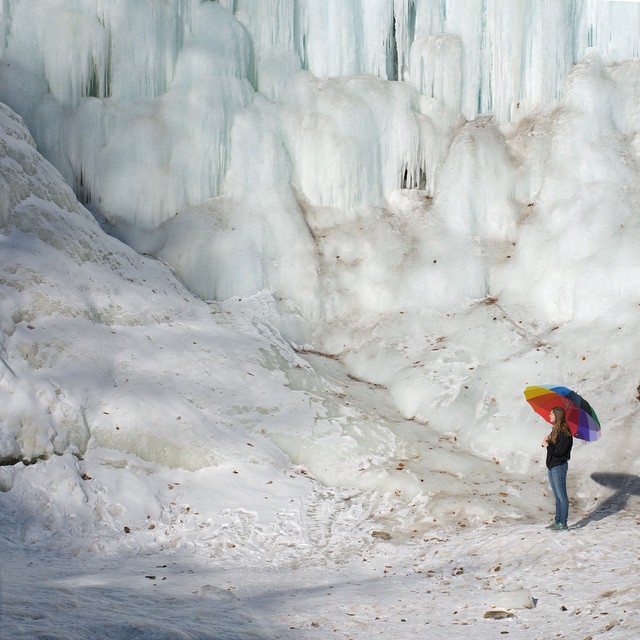 Ice Wall- Eliana and the ‘brella by the frozen Minnehaha Falls