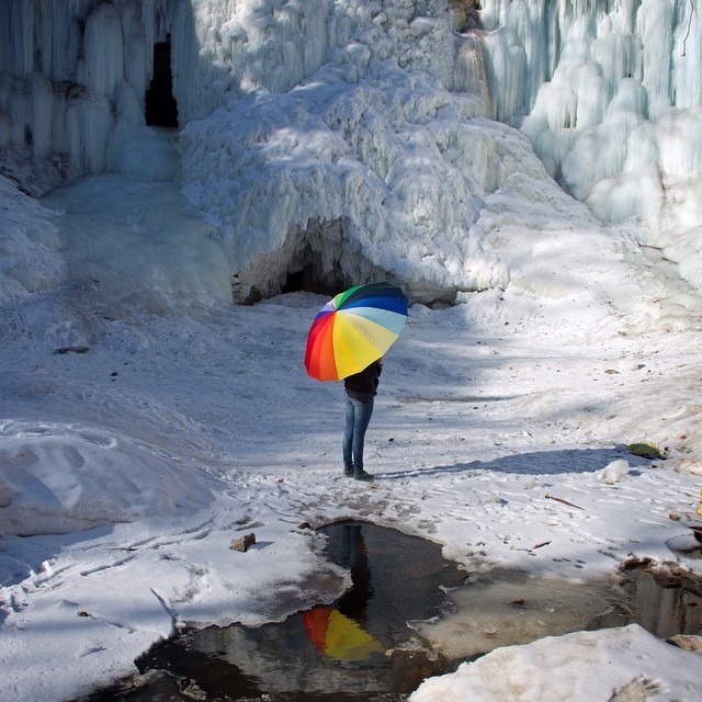 Reflection- Eliana, ‘brella and a puddle at Minnehaha Falls