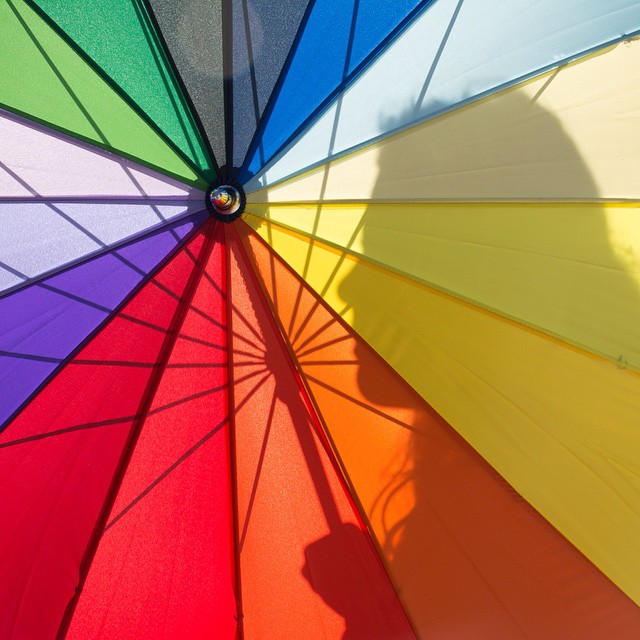 Color Play- shadow of daughter Eliana through the umbrella