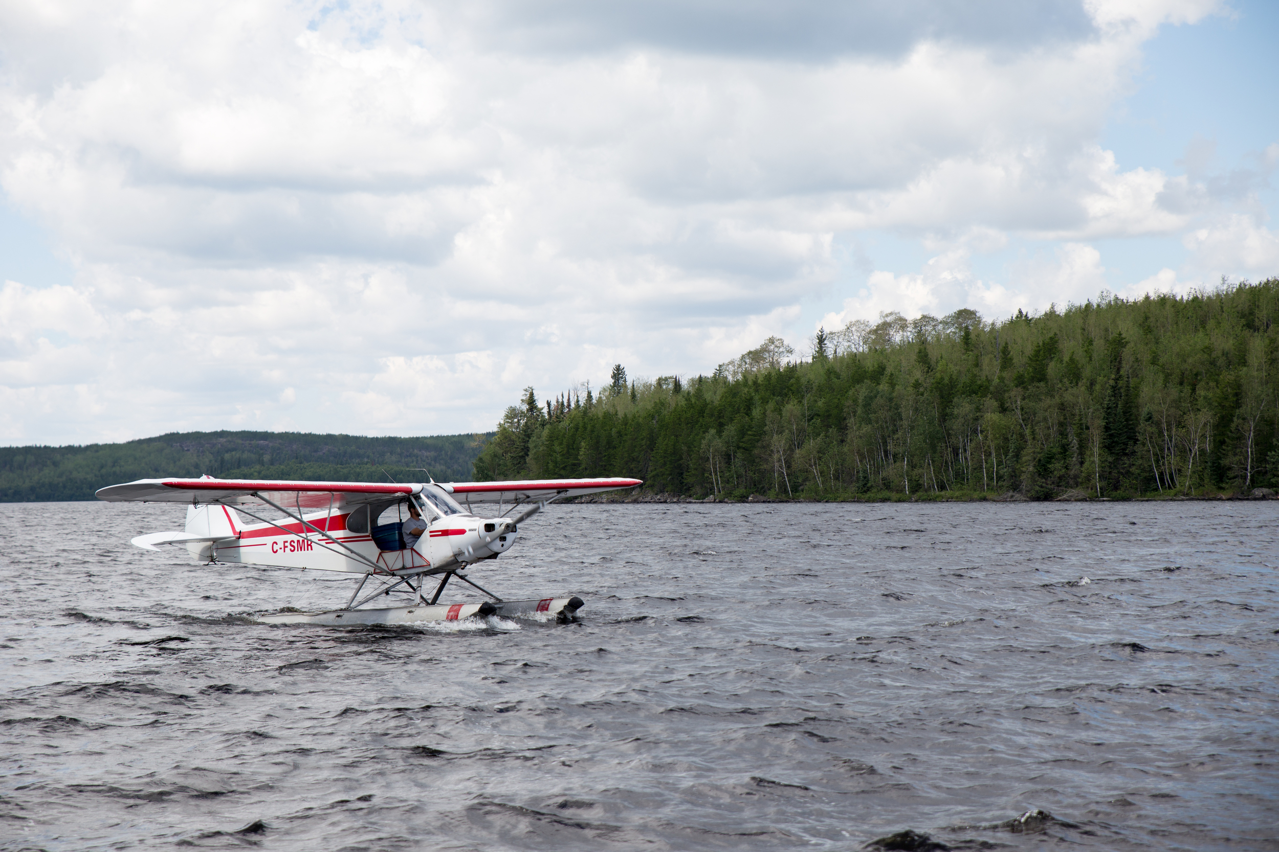 How the lodge gets bait. The pilot lands his plane in a stream, catches minnows and then delivers them to the remote lodges by landing on their lakes.