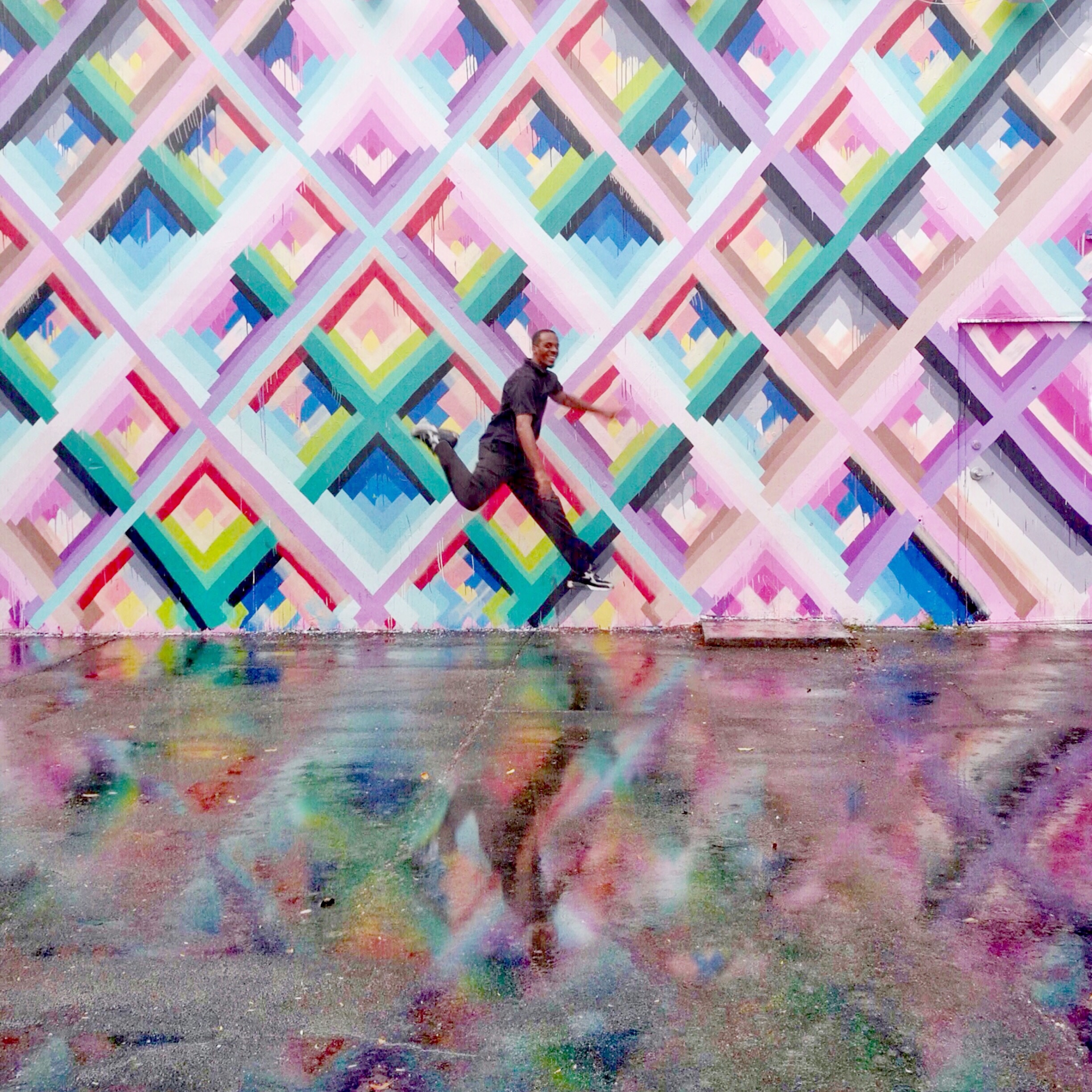 I caught a photo of our driver using Burst Mode at the Wynwood Walls area. He was awesome. We drove all around Miami in a fancy golf-cart-like car with Swoop!