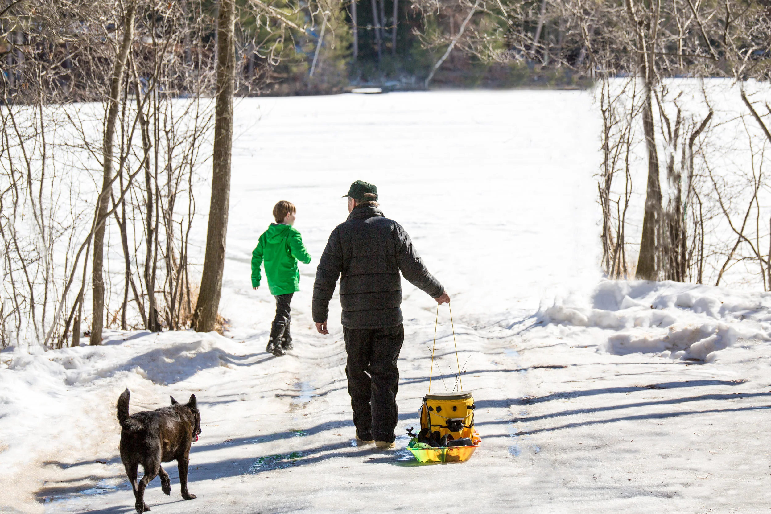 The ice-fishermen walking out to their spot on the lake