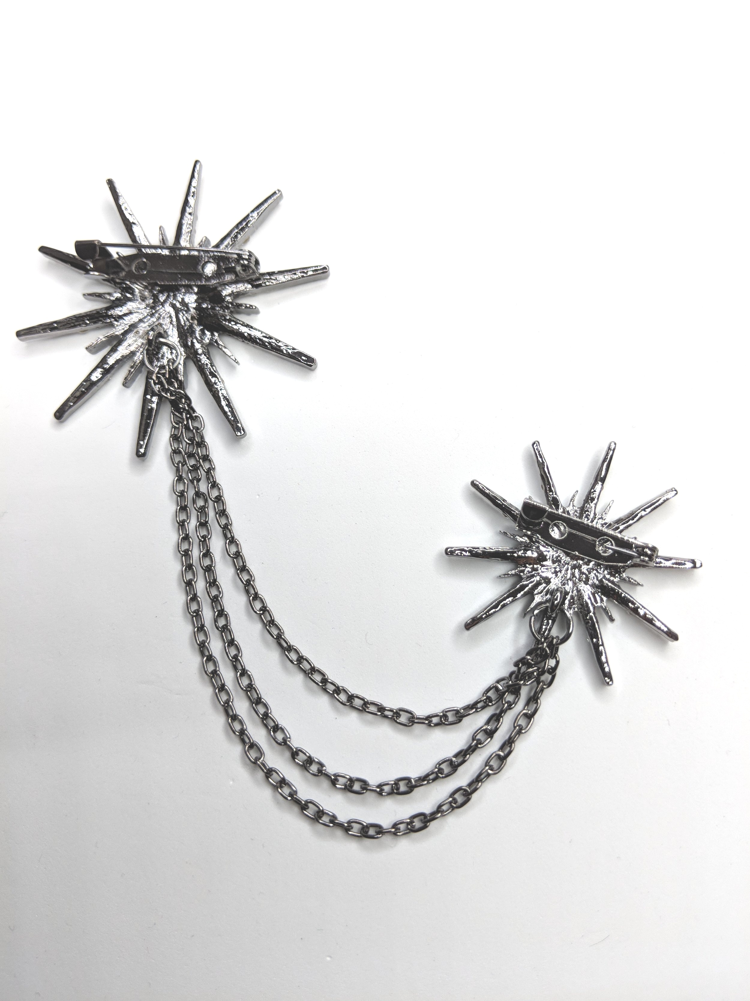 silver star double brooch 