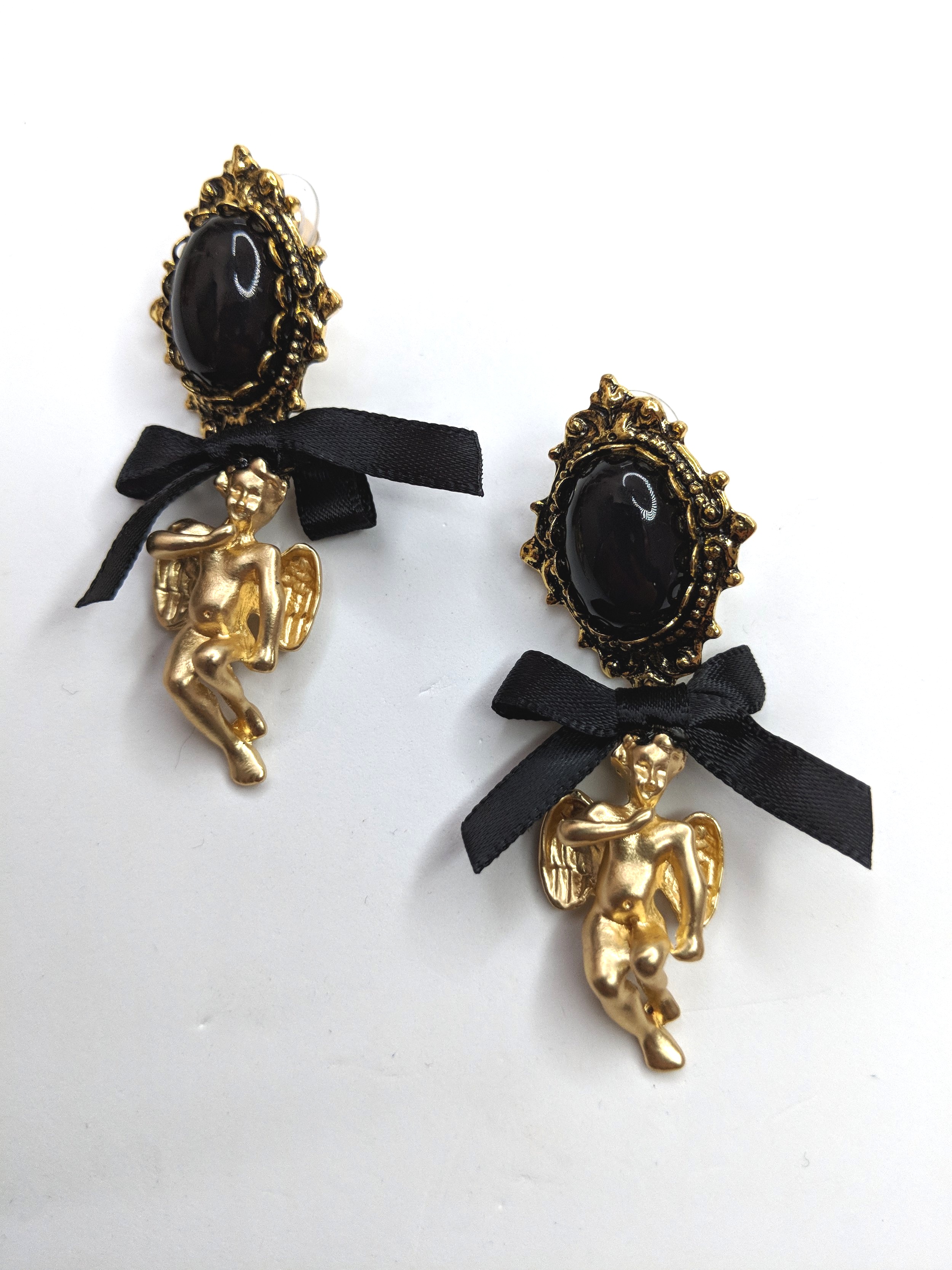 gold cupid earrings