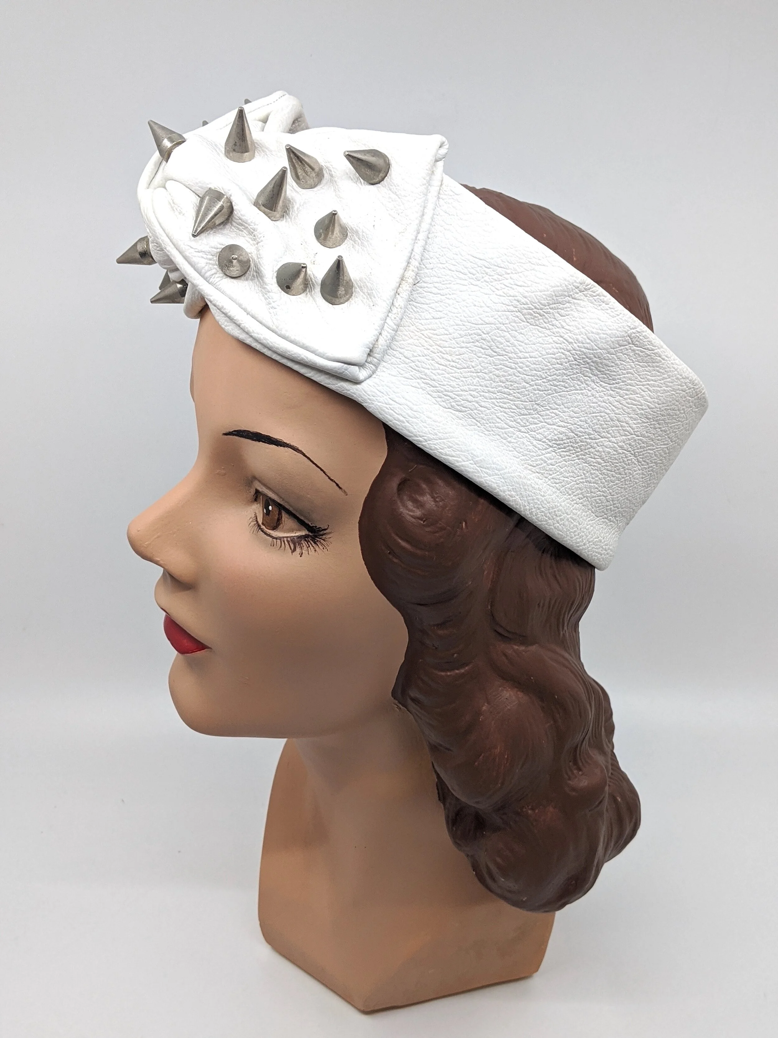 The House Of Hats White leather headpeice Millinery Sydney .jpg