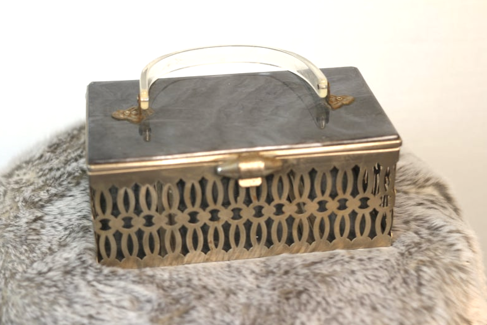 The house of Hats 1950s lucite mx bag .png